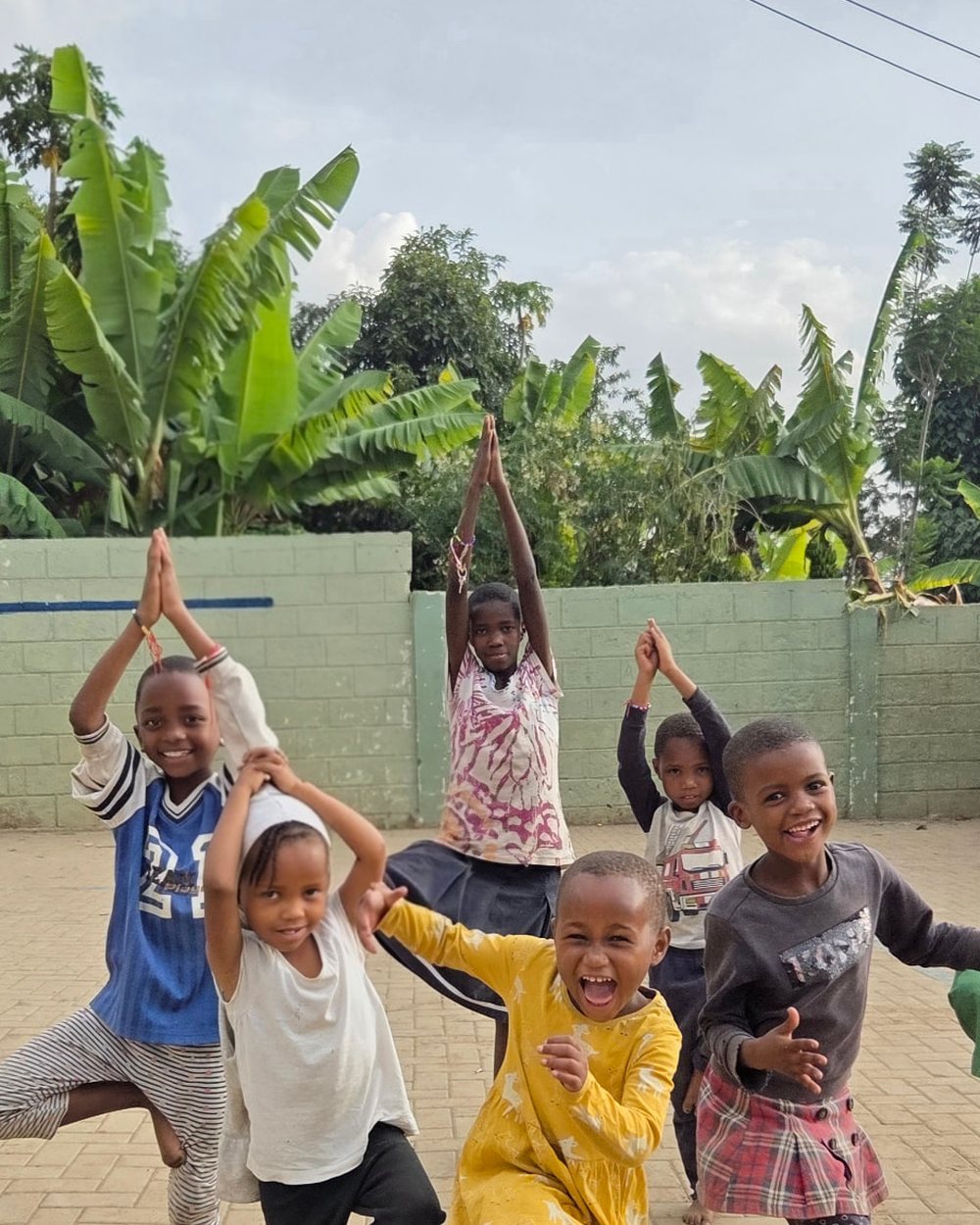 Children playing outside at the Fruitful Orphanage and Day Care Center in Arusha